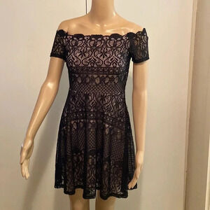 Rewind black lace dress size small